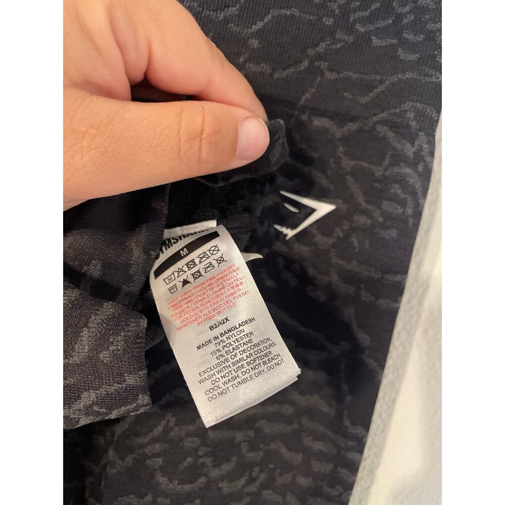 Gymshark gym shorts size medium black and animal print